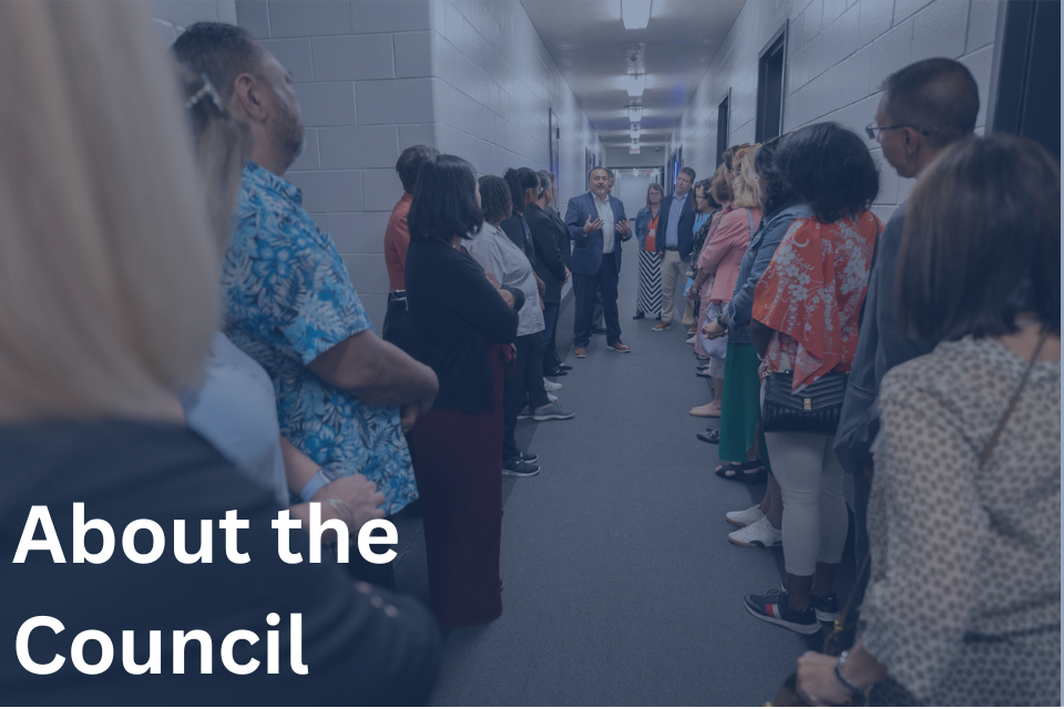 About the Council Group standing in hallway of an Opportunity Center featuring the text "About the Council"